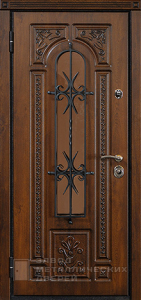 Фото «Дверь с ковкой №7»  в Красногорску